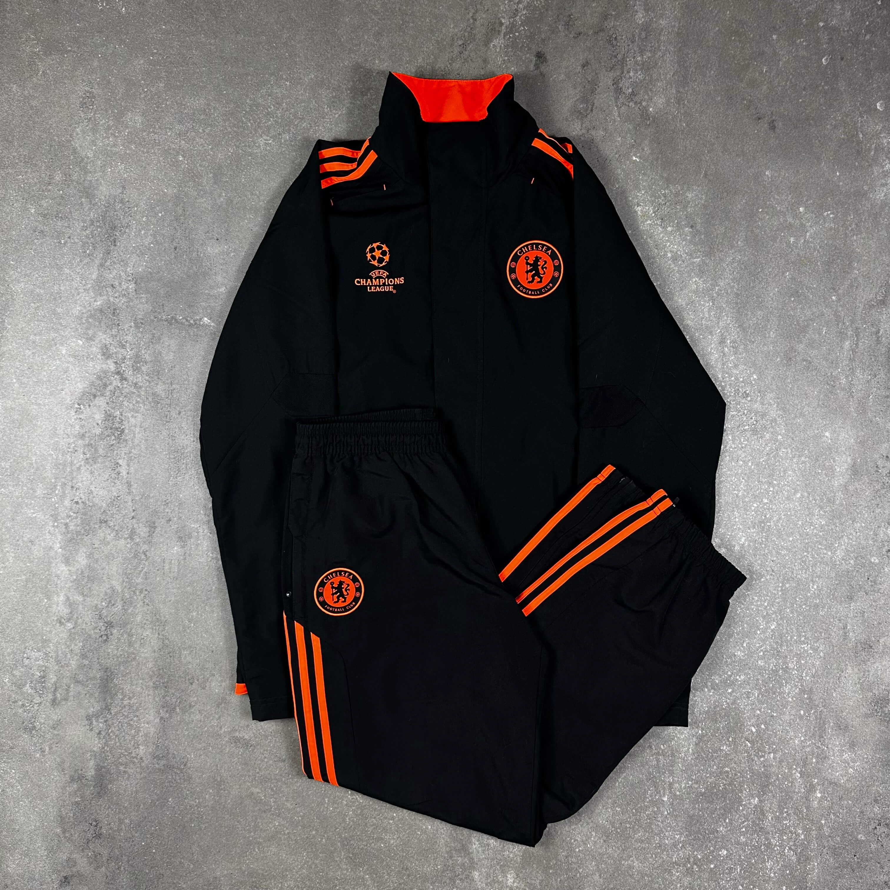 Chelsea black sale and orange tracksuit